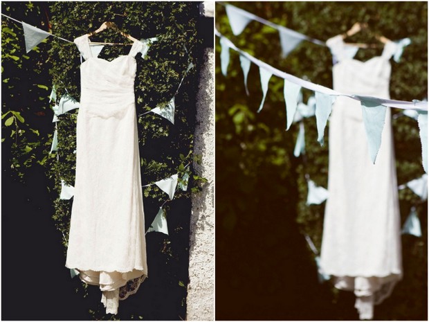 Wedding dress hanging up with bunting