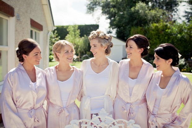 bridesmaids in pink silk robes