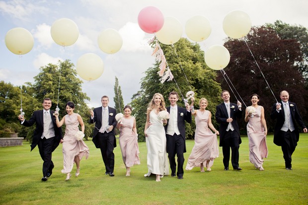 pink white oversized balloons wedding photo