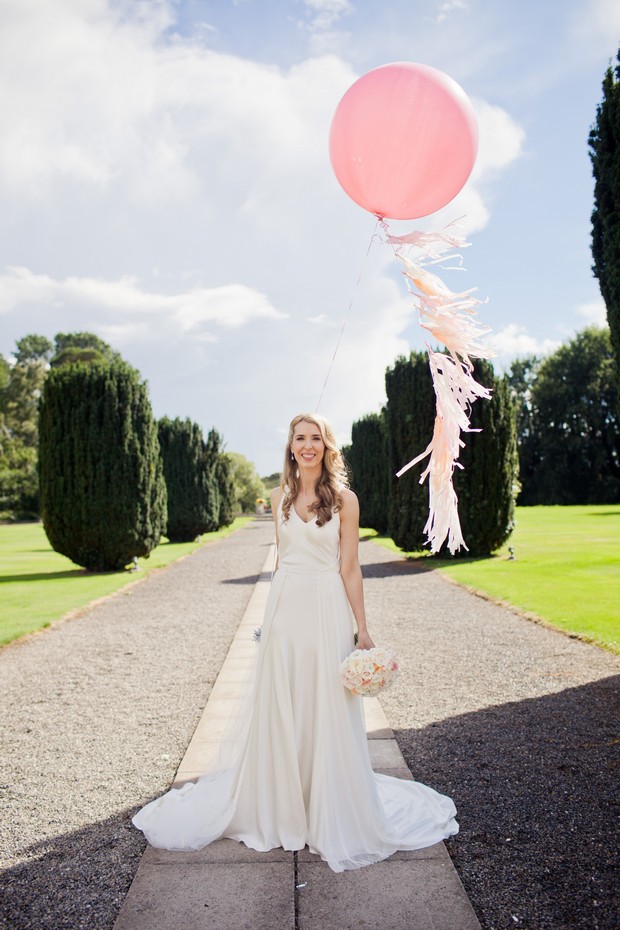 pink white oversized balloons wedding photo bride
