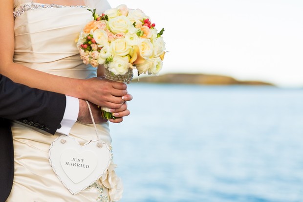 romantic wedding photo by the sea
