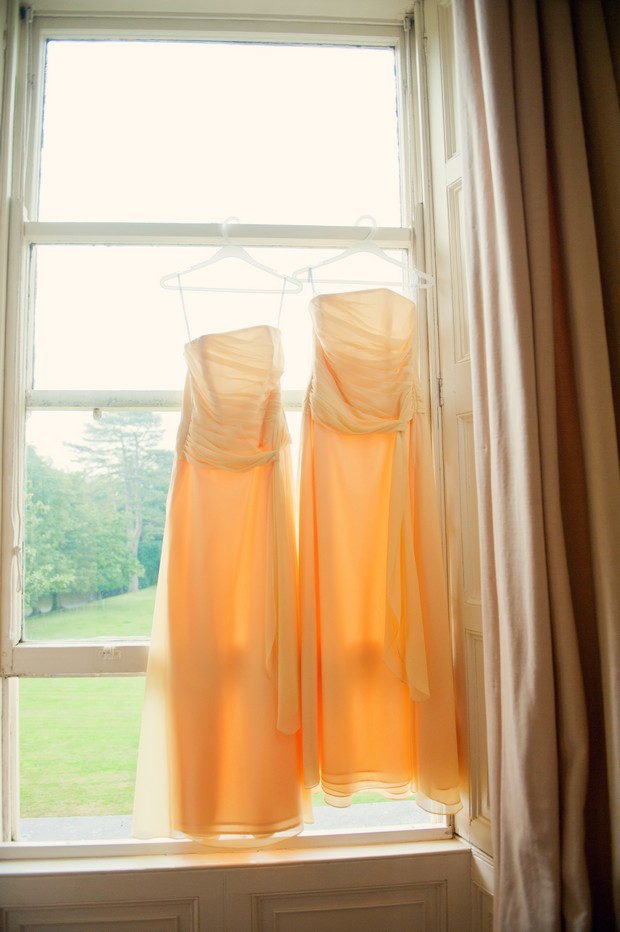 yellow bridesmaids dresses hanging