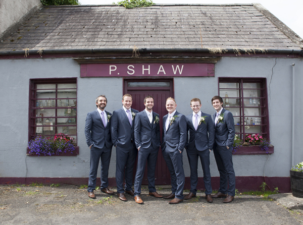 groomsmen outside old irish pub wedding
