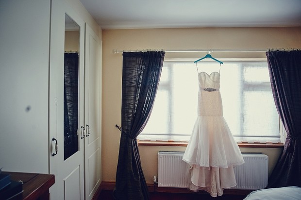 2-mermaid-wedding-dress-hanging-room