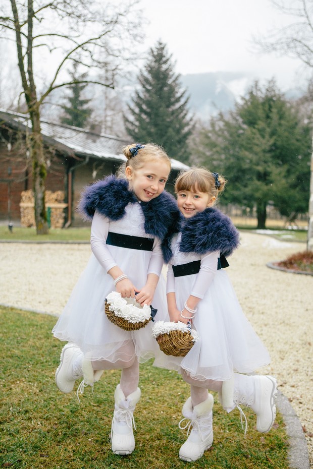 duck egg blue winter wedding flower girls in faux fur