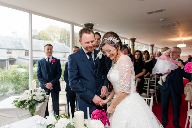 15-bride-laughing-during-wedding-vows