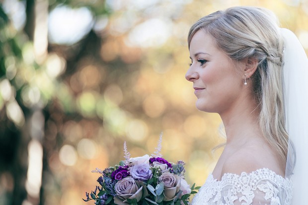 bride-with-pink-purple-bridal-bouquet