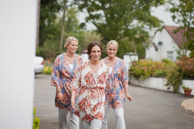 7_bridesmaids_in_floral_print_robes_street