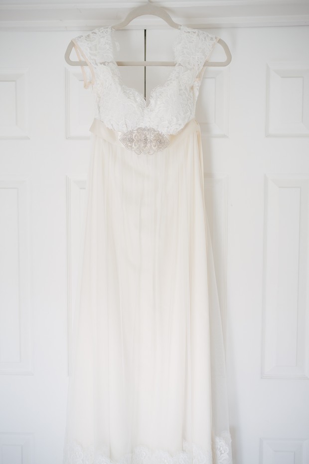 Claire Pettibone Lace Wedding Dress on Hanger