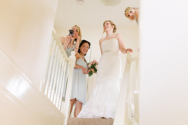 bride-at-top-of-stairs-home
