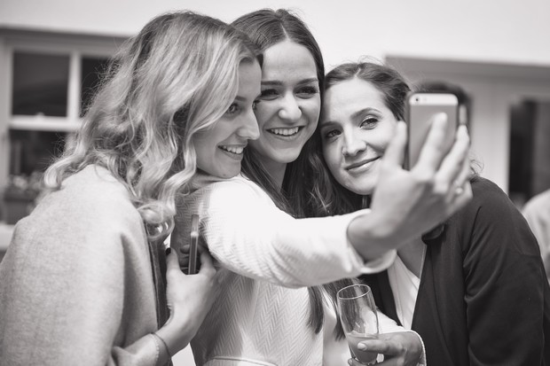 photo-of-wedding-guests-taking-selfies