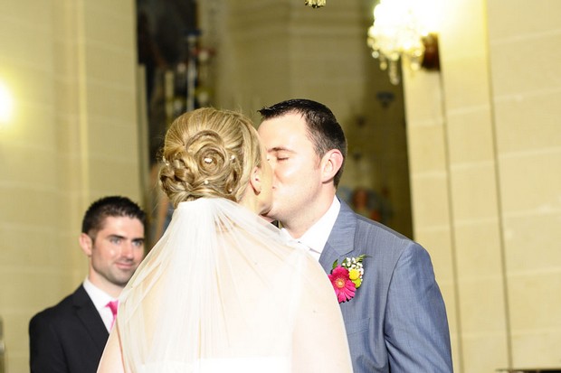 bride-groom-kissing-malta