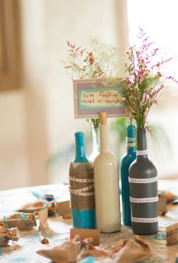 whimsical-festival-wedding-theme-centerpiece-rustic-wine-bottles-painted