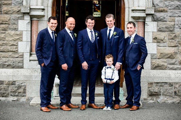 15-groomsmen-waiting-outside-church-wedding