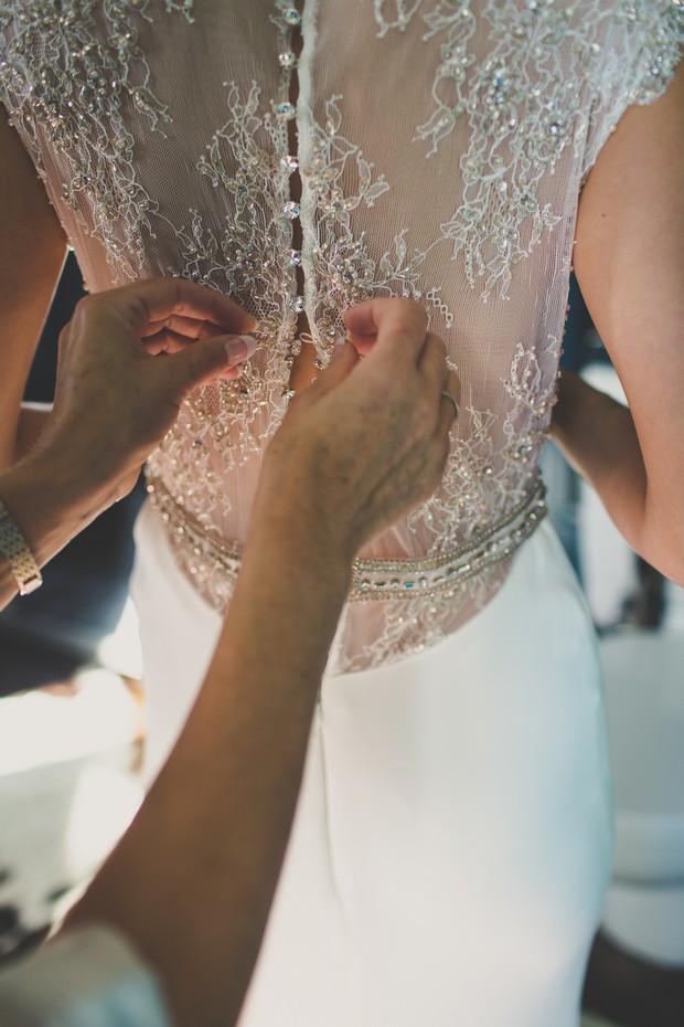 22_intricate_lace_back_wedding_Dress_badgley_mischka_fonda