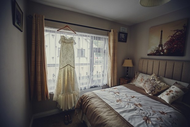 7-Wedding-Dress-Hanging-in-Bedroom-Window