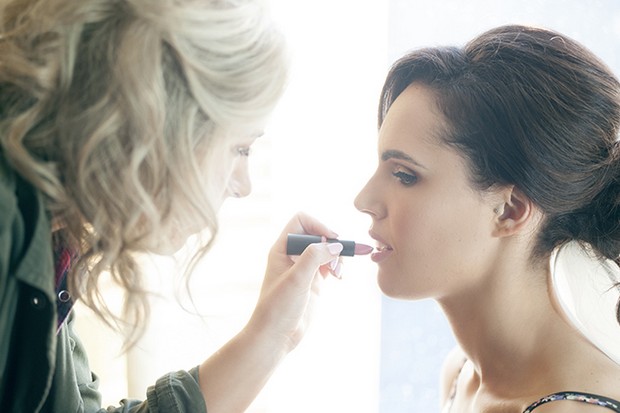 9-Bride-Applying-Lipstick-Wedding-Makeup