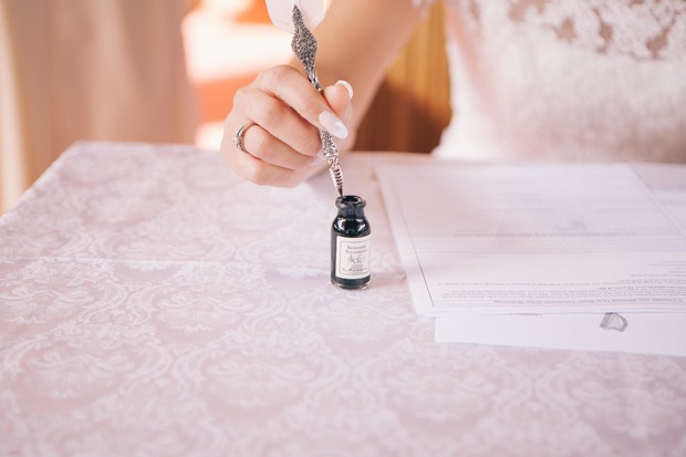 bride-signing-registrar