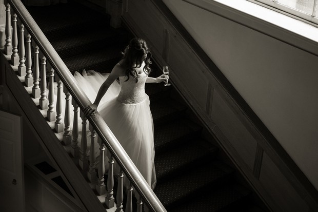 13-Bride-sweeping-down-stairs-black-white-photo-Paul-Kelly-Photography (2)
