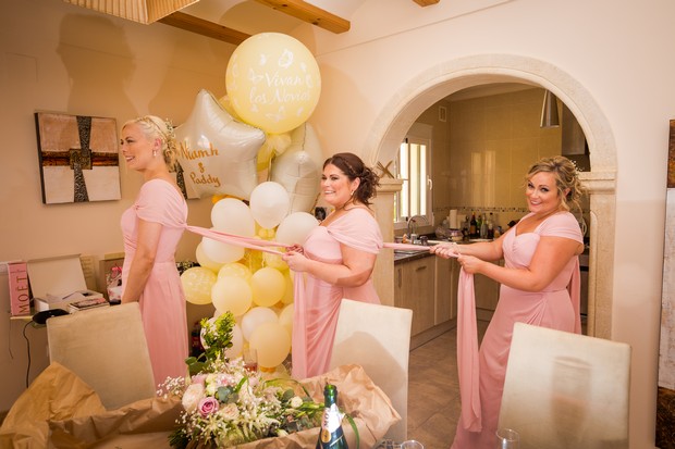 10-bridesmaids-getting-ready-dresses-line-up-weddingsonline