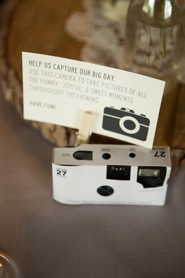 nostalgic-wedding-ideas-leave-out-disposable-camers-for-guests-to-take-photos-wedding-table-fun