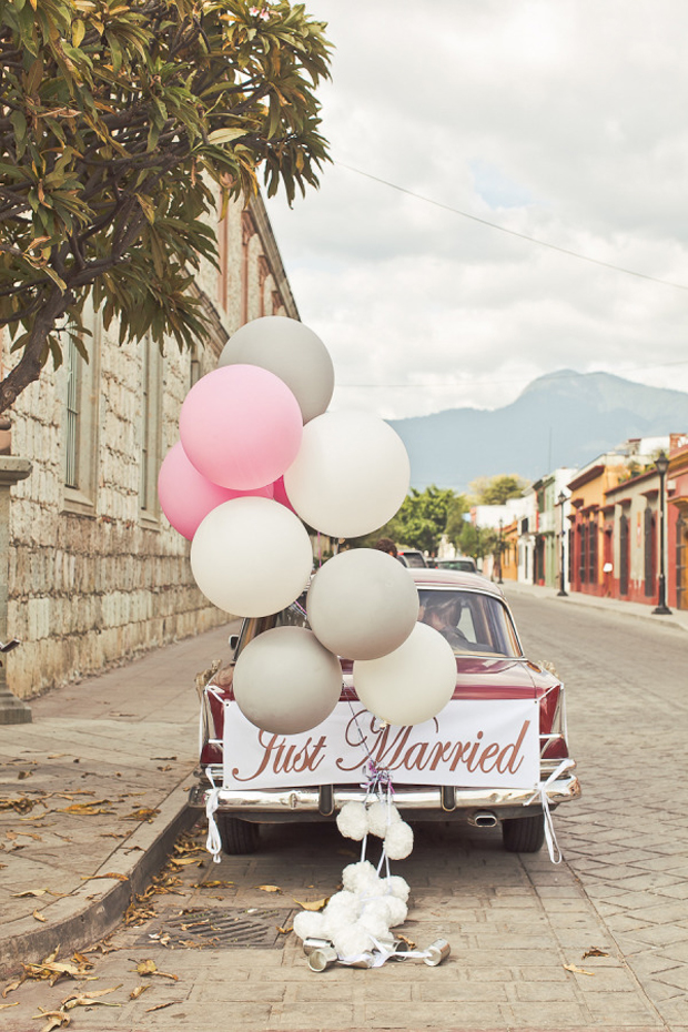 wedding-getaway-car-with-balloons-and-just-married-sign