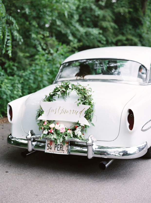 wedding-getaway-car-with-floral-wreath