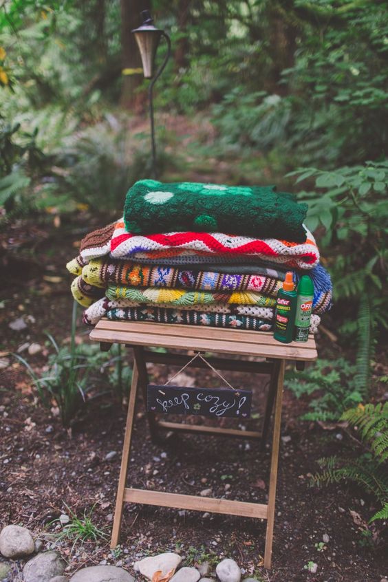 outdoor-forest-wedding-blankets-guests