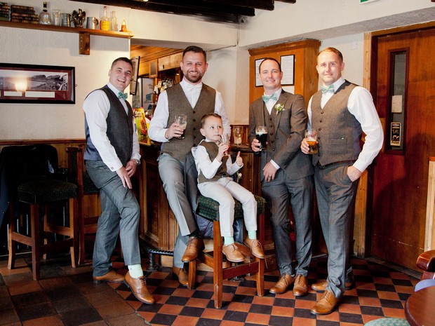 bellingham-castle-real-wedding-groom-and-groomsmen-having-pre-wedding-drink