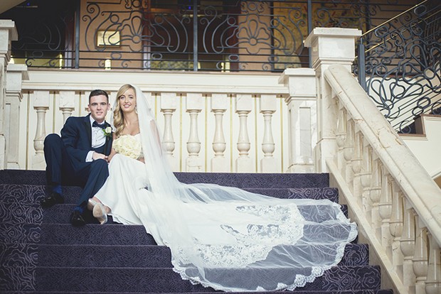 bride-groom-sitting-on-stairs-heritage-killenard