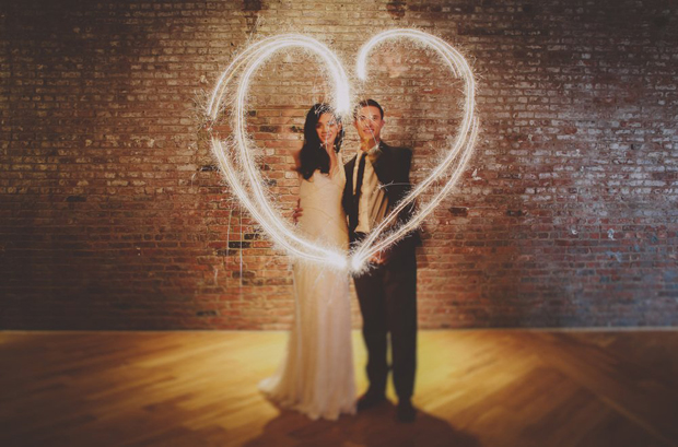 couple--with-Wedding-Sparklers-heart-shape