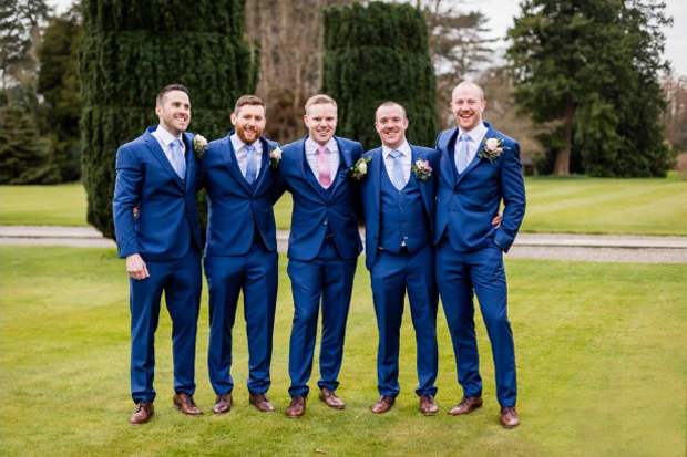 groom-and-groomsmen-in-navy-blue-suits-from-best-menswear