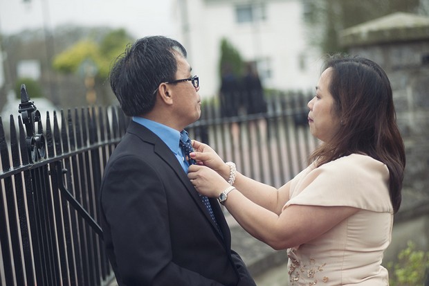 19-Wedding-guests-outside-church-Couple-Photography-weddingsonline