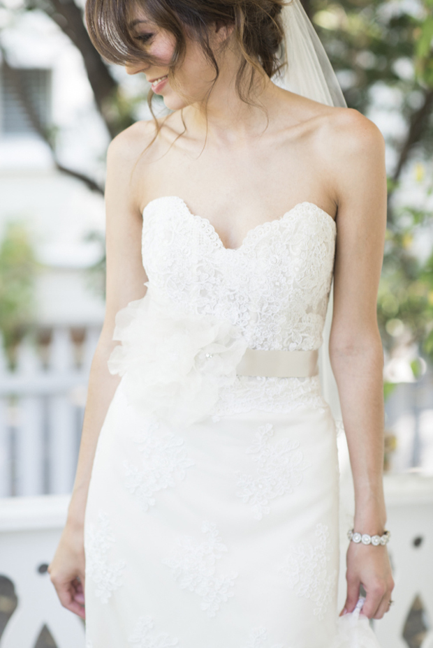 bride-in-wedding-dress-with-floral-corsage-bridal-belt