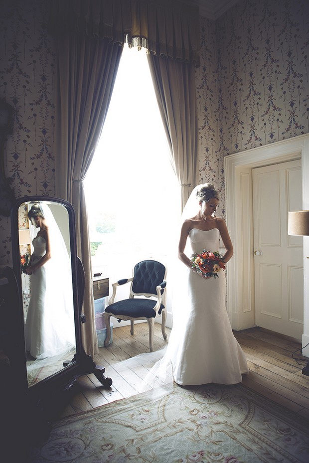 15-Romantic-bridal-portrait-suite-window-Couple-Photography-weddingsonline