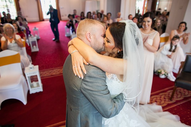 lucan-spa-hotel-real-wedding-konrad-kubic-ceremony-bride-and-groom-kissing