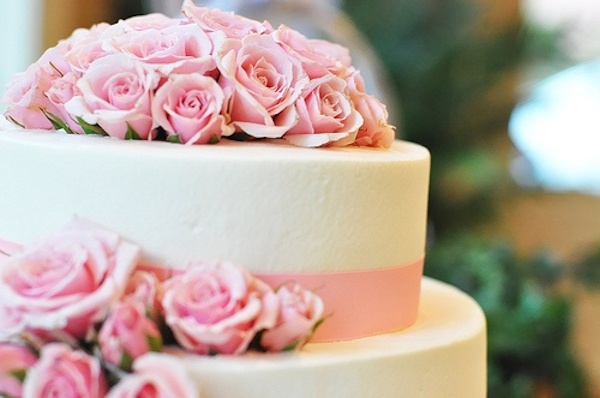Rose topped wedding cake
