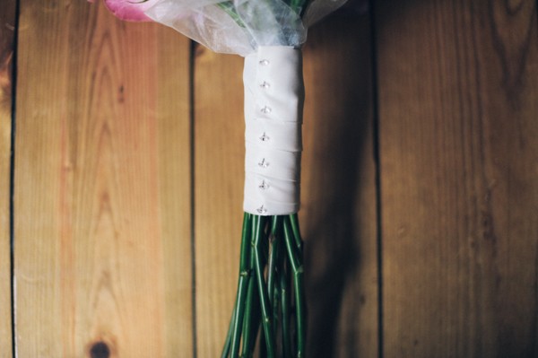 pink bouquet with white ribbon