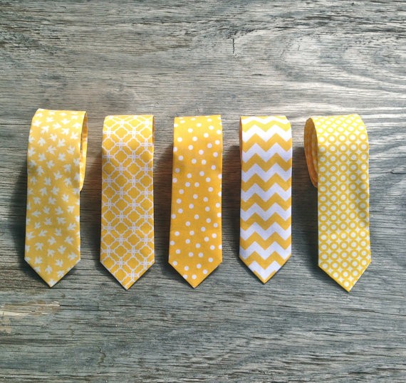 Selection of yellow ties for the groom