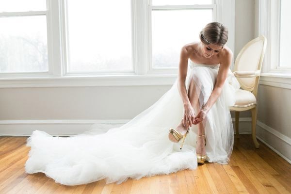 Bride and her pretty wedding shoes