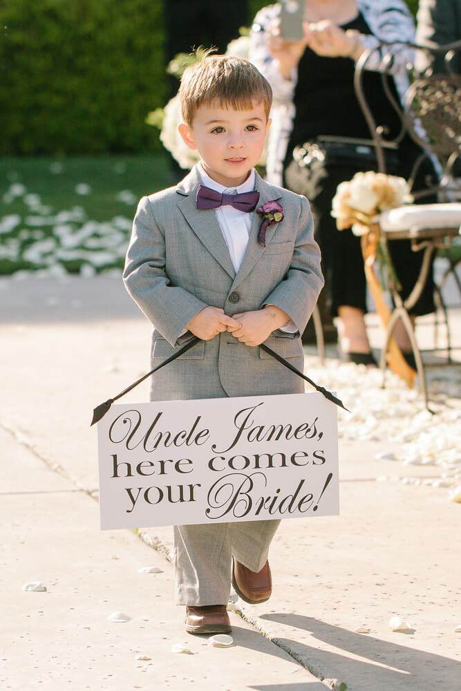 page-boy-sign-here-comes-your-bride