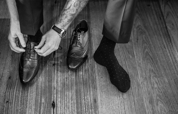 6-Groom-Getting-Ready-Shoes-Black-White-Photo